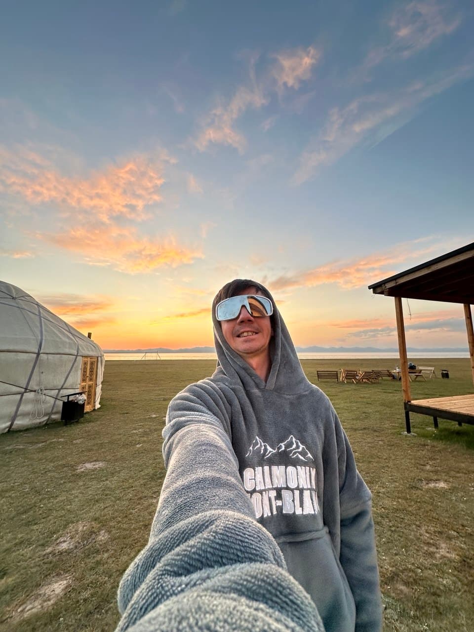 Kyrgyzstan360 founder by a yurt and lake in Kyrgyzstan